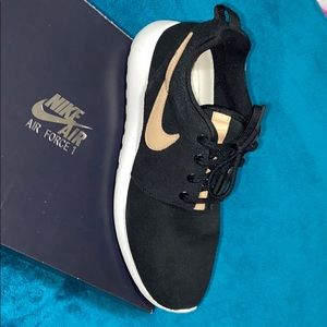 Black suede with tan leather Nike sneakers